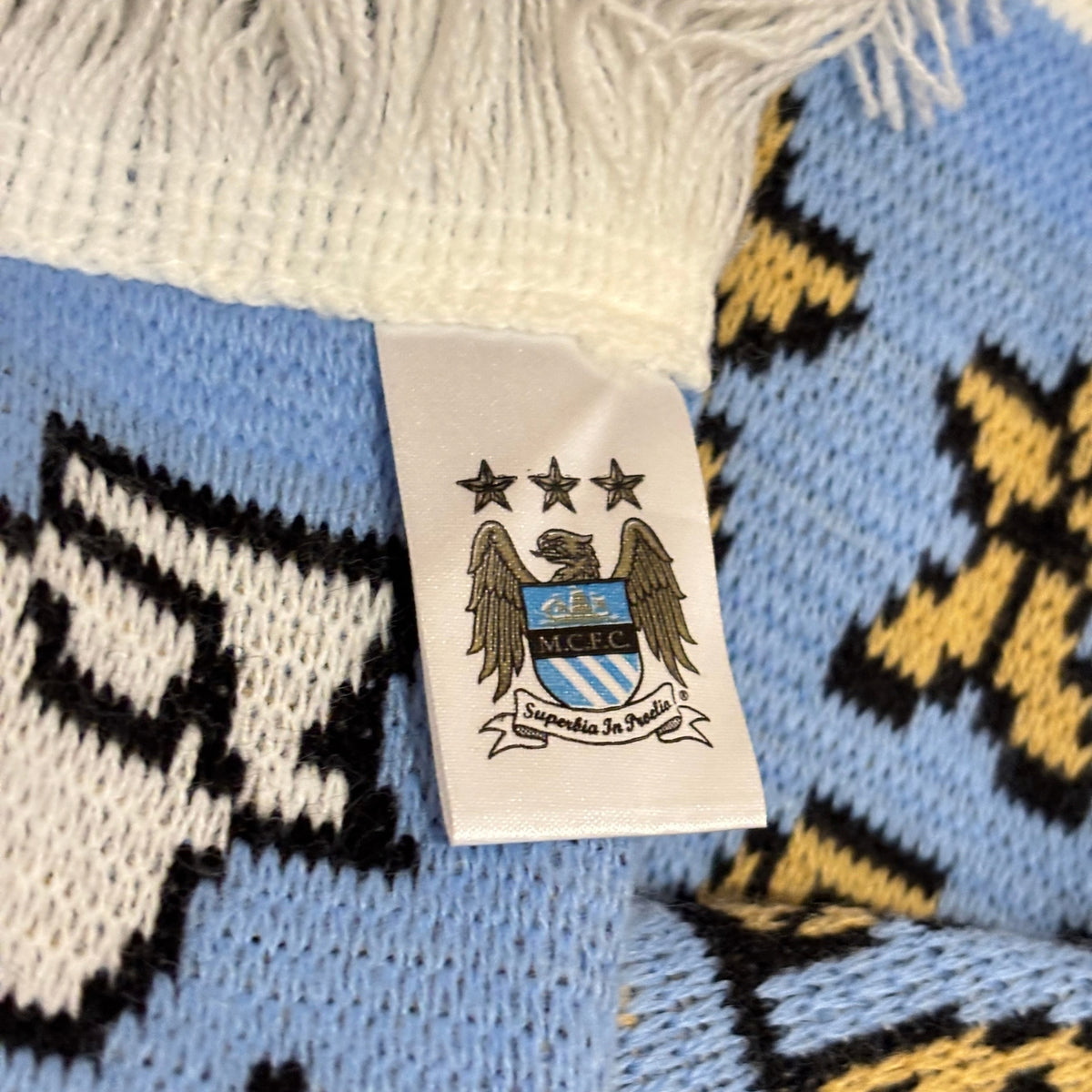Bufanda de fútbol oficial Manchester City franjas celestes y blancas