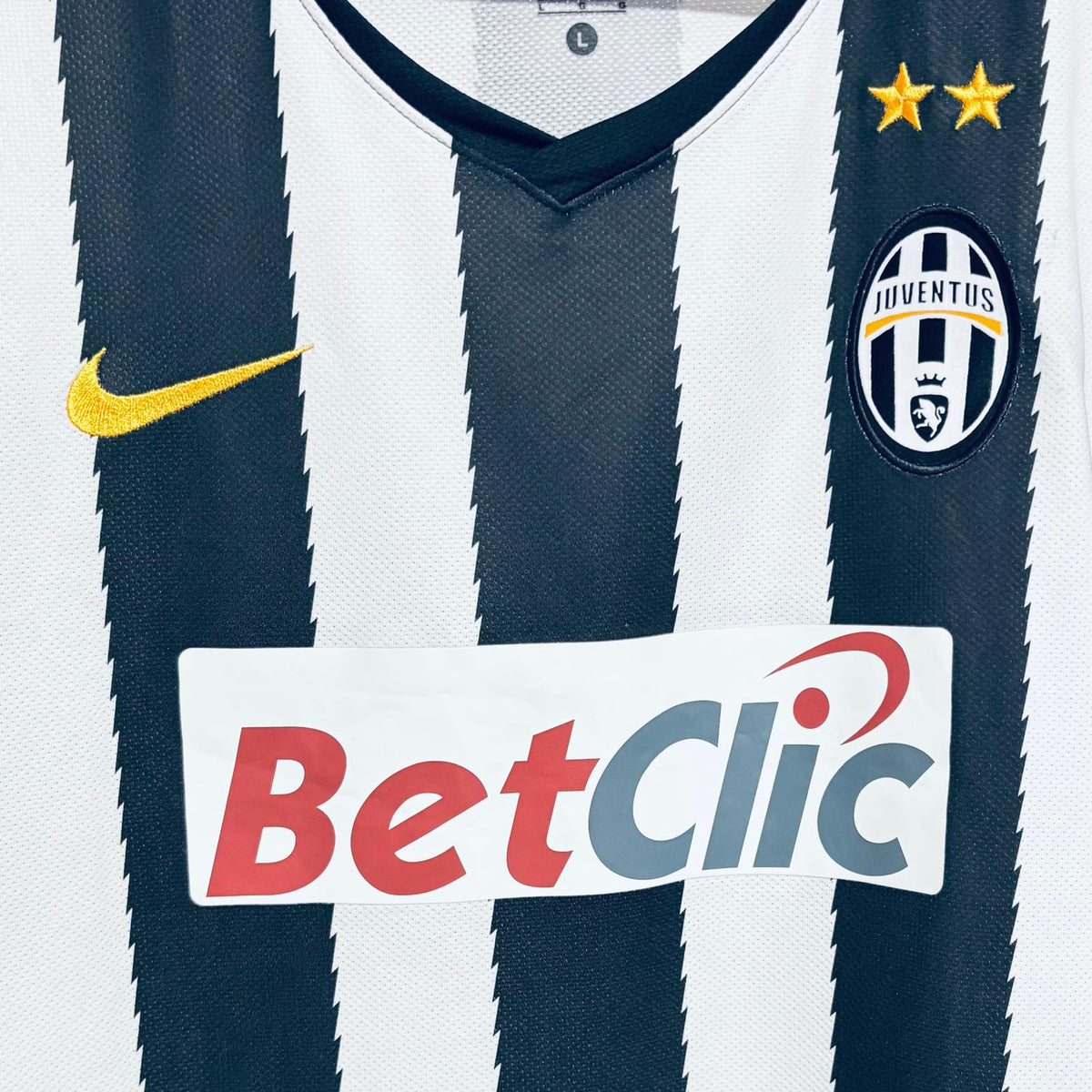 camiseta de futbol de la juventus de turin primera equipacion nike 2010 2011 rayas negras y blancas